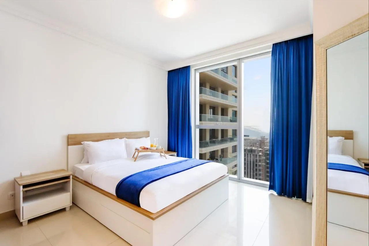 Апартаменты Livbnb - 2Br Burj View In Boulevard Point Дубай ОАЭ